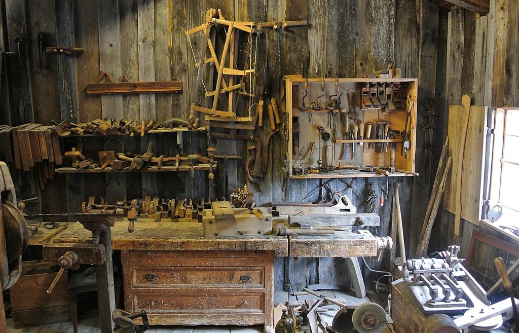 Woodworking shop with hand tools on the wall